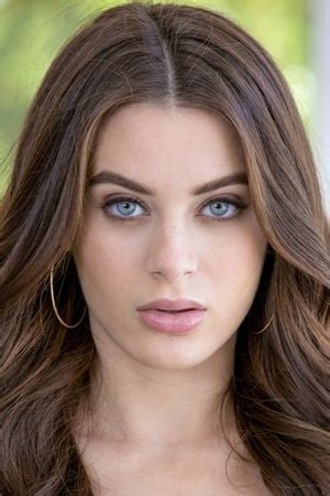 Lana Rhoades is a stunning Czechoslovakian beauty who hails from the great state of Wisconsin. Lana grew up around a lot of farm land, and she admits she grew up as a tomboy. In high school, she excelled academically and graduated early at the age of 17. Lana also loved sports in school and was active in gymnastics and cheerleading.